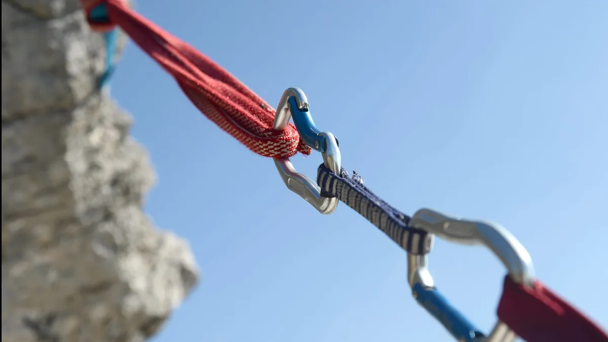 Climbing carabiners connecting two ropes